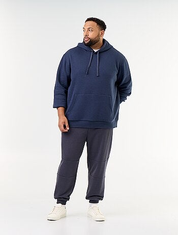 Pantaloni da jogging con fondo stretto e tasche con zip