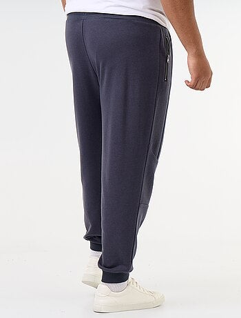 Pantaloni da jogging con fondo stretto e tasche con zip