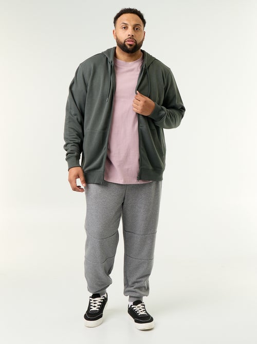 Pantaloni da jogging con fondo stretto e tasche con zip - Kiabi Pantaloni da jogging con fondo stretto e tasche con zip - Kiabi