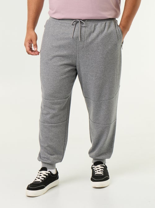Pantaloni da jogging con fondo stretto e tasche con zip - Kiabi Pantaloni da jogging con fondo stretto e tasche con zip - Kiabi