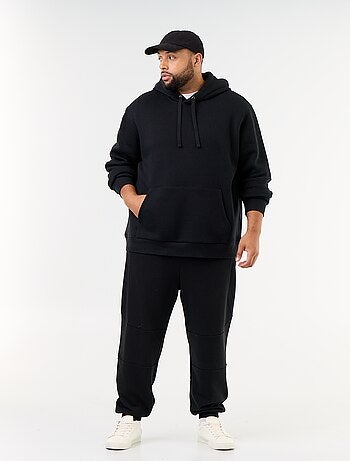 Pantaloni da jogging con fondo stretto e tasche con zip