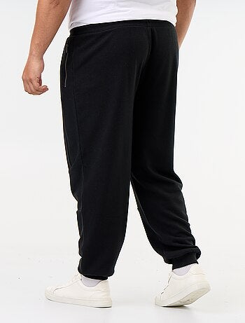 Pantaloni da jogging con fondo stretto e tasche con zip