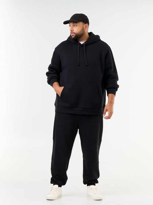 Pantaloni da jogging con fondo stretto e tasche con zip - Kiabi Pantaloni da jogging con fondo stretto e tasche con zip - Kiabi