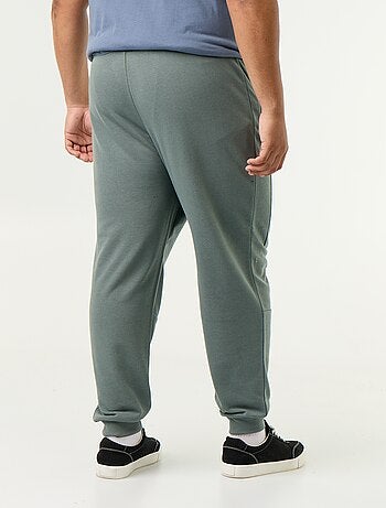 Pantaloni da jogging con fondo stretto e tasche con zip