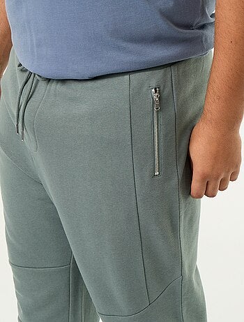 Pantaloni da jogging con fondo stretto e tasche con zip