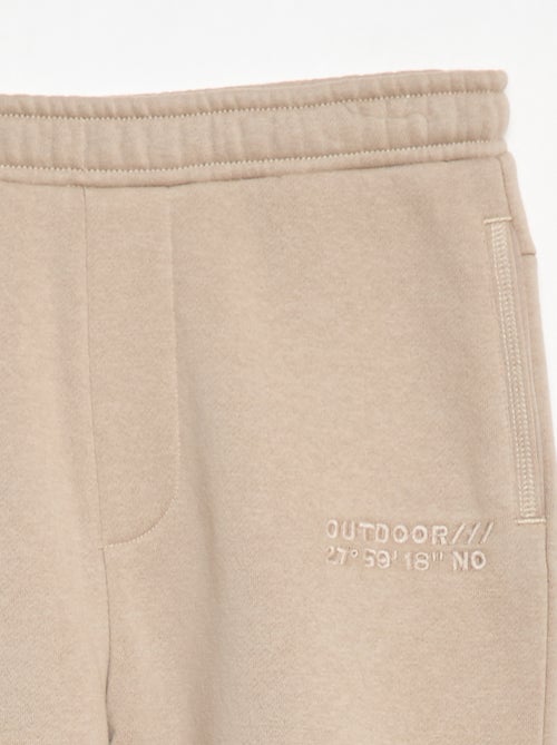 Pantaloni da jogging con scritta ricamata - Kiabi