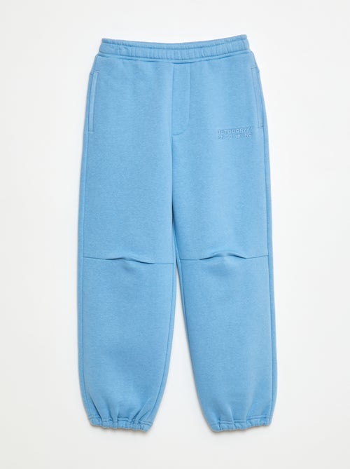 Pantaloni da jogging con scritta ricamata - Kiabi