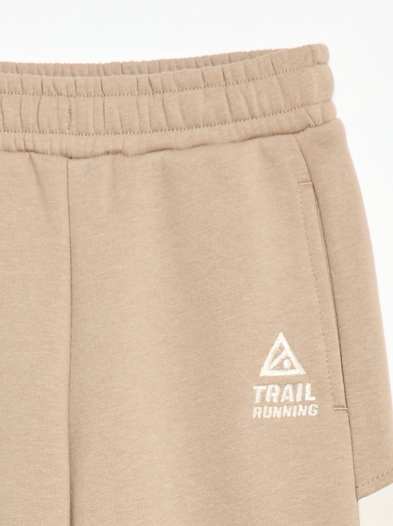 Pantaloni da jogging in felpa color block Beige - Kiabi