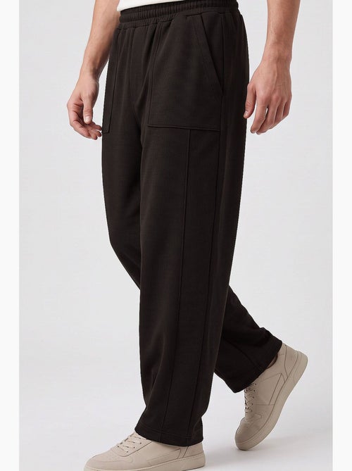 Pantaloni da jogging rilassati tommy - Kiabi Pantaloni da jogging rilassati tommy - Kiabi