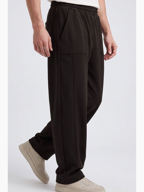 Pantaloni da jogging rilassati tommy - Kiabi Pantaloni da jogging rilassati tommy - Kiabi