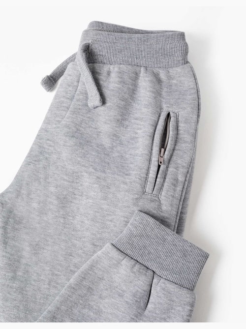 Pantaloni da jogging spazzolati con coulisse e tasche - Kiabi Pantaloni da jogging spazzolati con coulisse e tasche - Kiabi