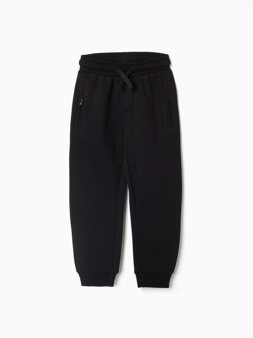 Pantaloni da jogging spazzolati con coulisse e tasche - Kiabi Pantaloni da jogging spazzolati con coulisse e tasche - Kiabi