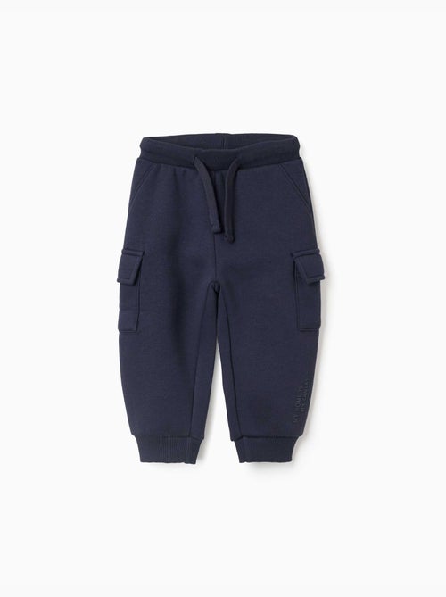 Pantaloni da jogging spazzolati con tasche cargo e stampa - Kiabi Pantaloni da jogging spazzolati con tasche cargo e stampa - Kiabi