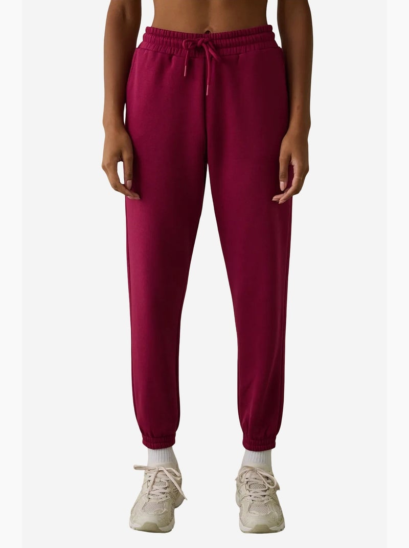 Pantaloni da tuta a vita alta con dettaglio da annodare, garzati penti Magenta - Kiabi