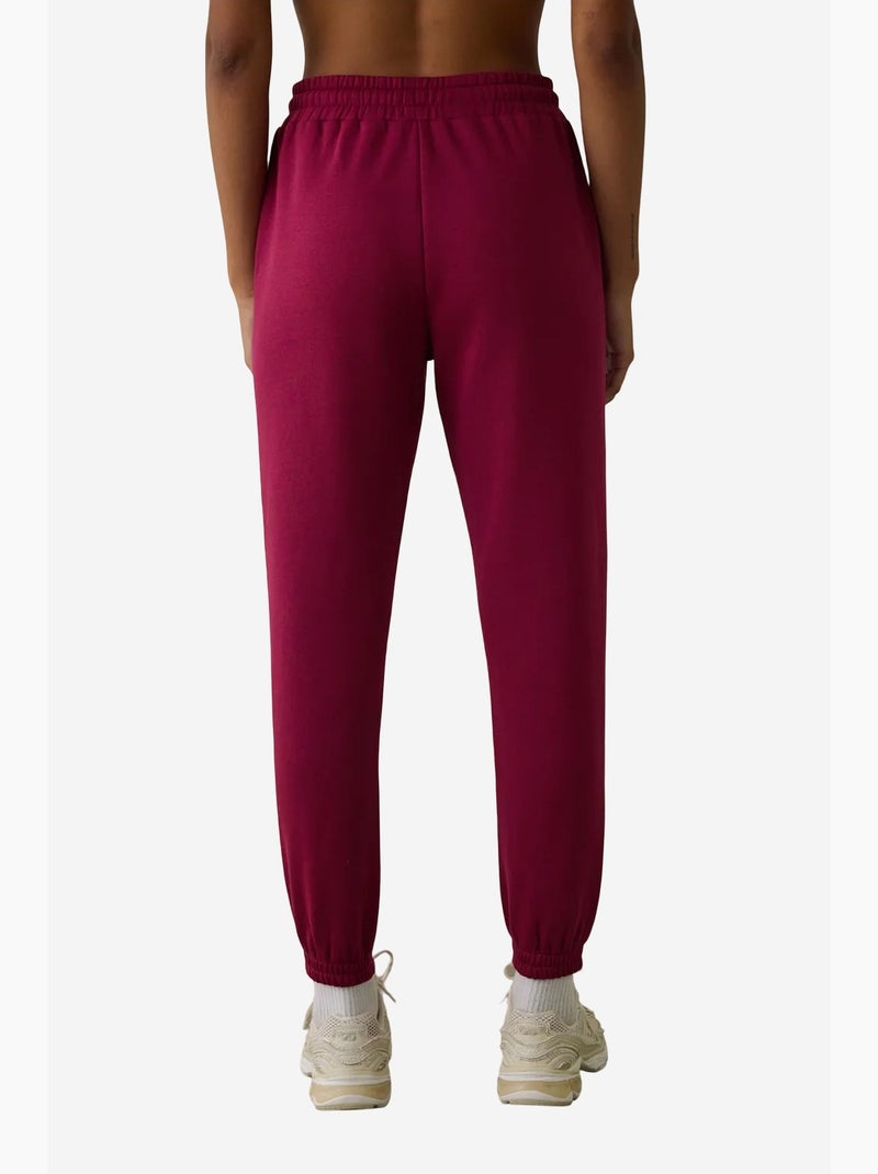 Pantaloni da tuta a vita alta con dettaglio da annodare, garzati penti Magenta - Kiabi