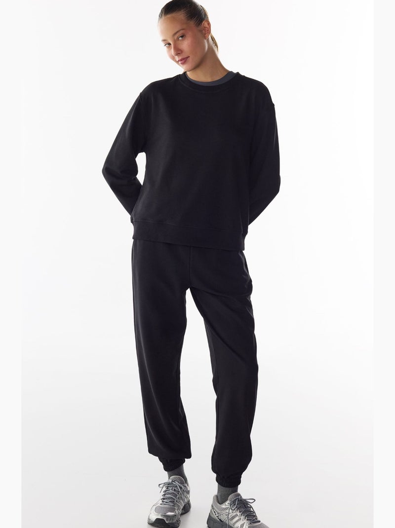 Pantaloni da tuta a vita alta con polsini elastici penti Nero - Kiabi