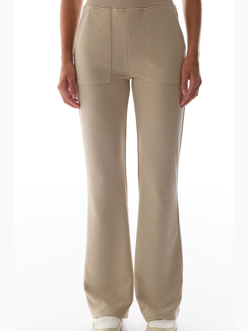 Pantaloni da tuta a zampa con dettaglio ribana penti Beige argilla - Kiabi