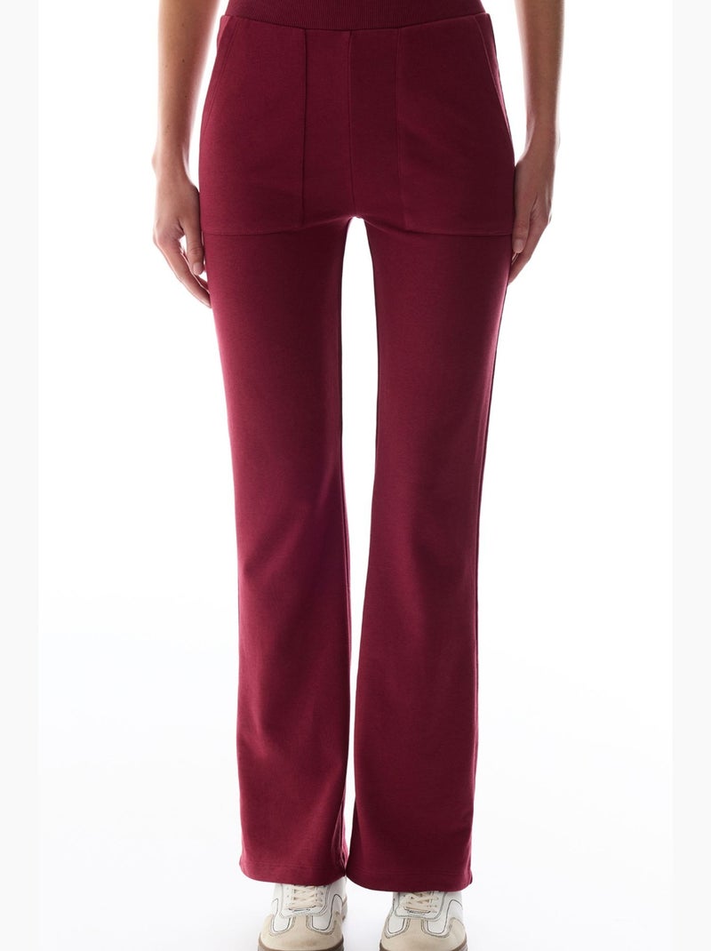 Pantaloni da tuta a zampa con dettaglio ribana penti Rosso bordeaux - Kiabi