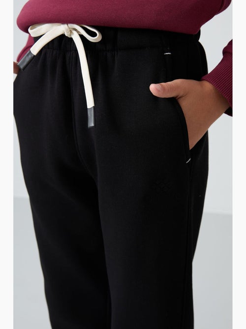 Pantaloni da tuta bambino tommy - Kiabi Pantaloni da tuta bambino tommy - Kiabi