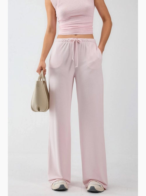 Pantaloni della tuta a gamba ampia con vita con coulisse busem - Kiabi Pantaloni della tuta a gamba ampia con vita con coulisse busem - Kiabi