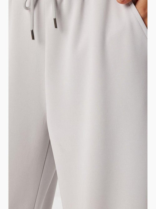 Pantaloni della tuta a gamba larga con vita a coulisse istanbul - Kiabi Pantaloni della tuta a gamba larga con vita a coulisse istanbul - Kiabi