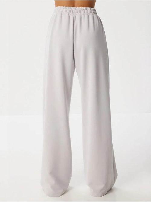 Pantaloni della tuta a gamba larga con vita a coulisse istanbul - Kiabi Pantaloni della tuta a gamba larga con vita a coulisse istanbul - Kiabi