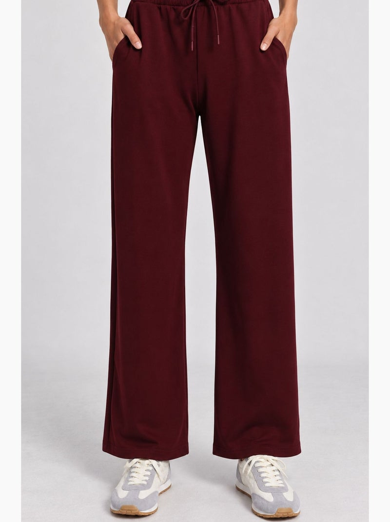 Pantaloni della tuta a gamba larga con vita a coulisse istanbul Rosso bordeaux - Kiabi