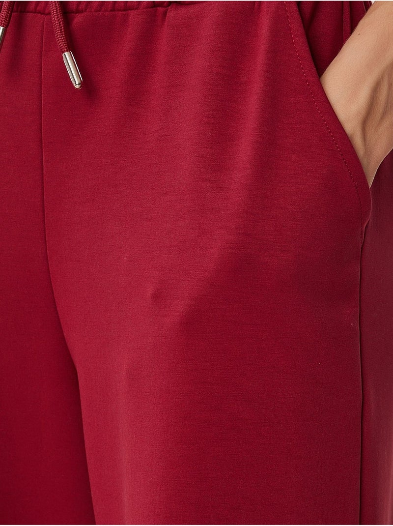Pantaloni della tuta a gamba larga con vita a coulisse istanbul Rosso cashmere - Kiabi
