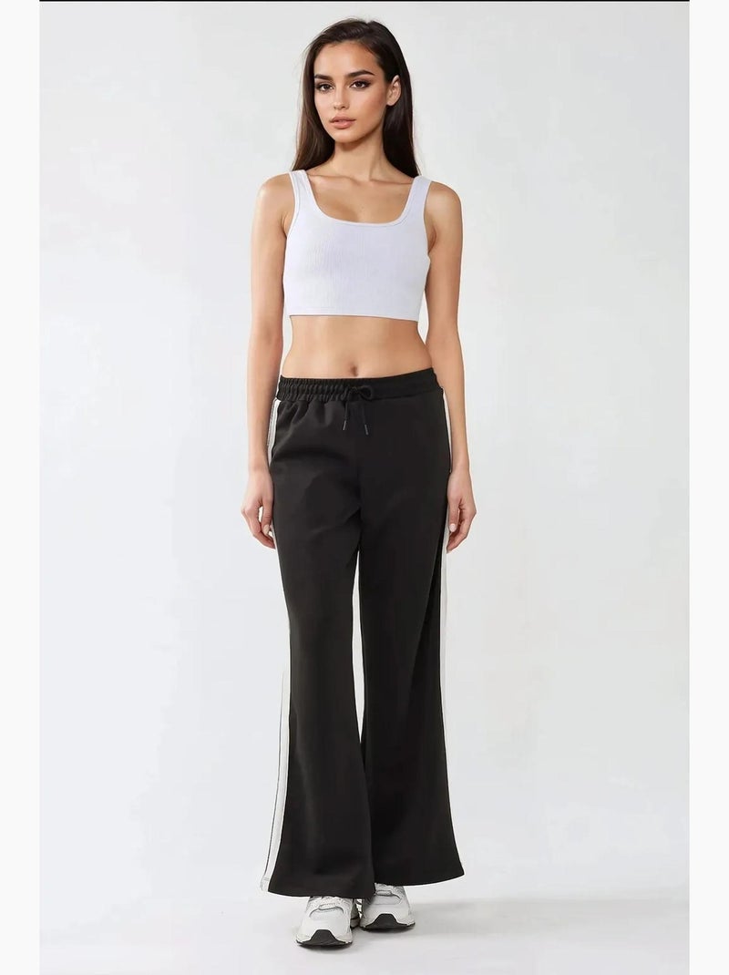 Pantaloni della tuta a righe a gamba ampia hiccup Nero - Kiabi