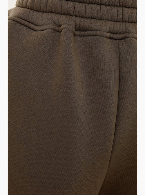 Pantaloni della tuta con elastico in vita di base hiccup - Kiabi Pantaloni della tuta con elastico in vita di base hiccup - Kiabi