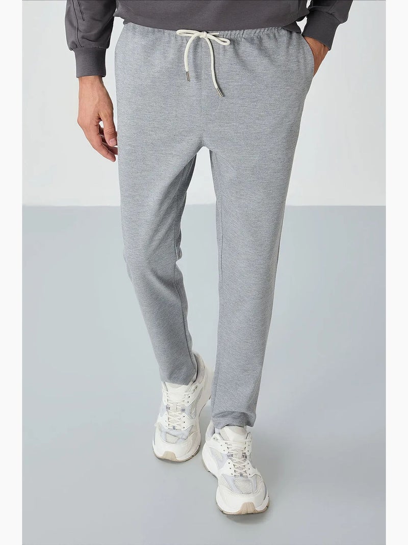 Pantaloni della tuta da uomo in cotone-poliestere tommy Grigio chiaro - Kiabi