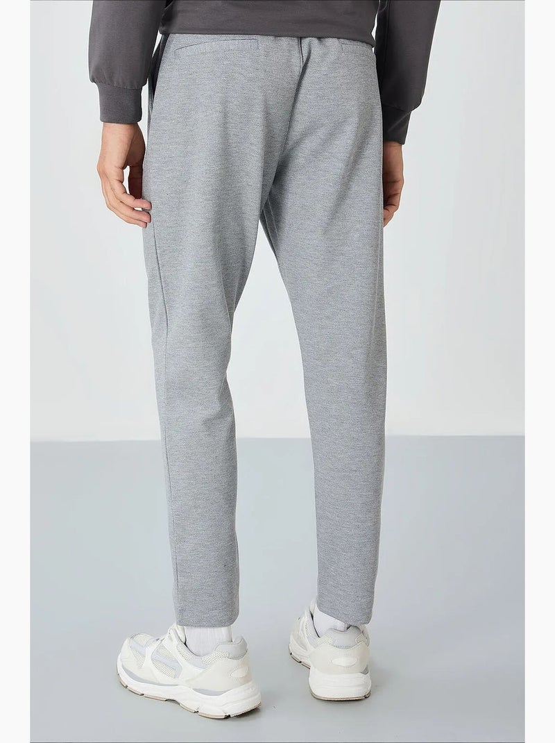 Pantaloni della tuta da uomo in cotone-poliestere tommy Grigio chiaro - Kiabi
