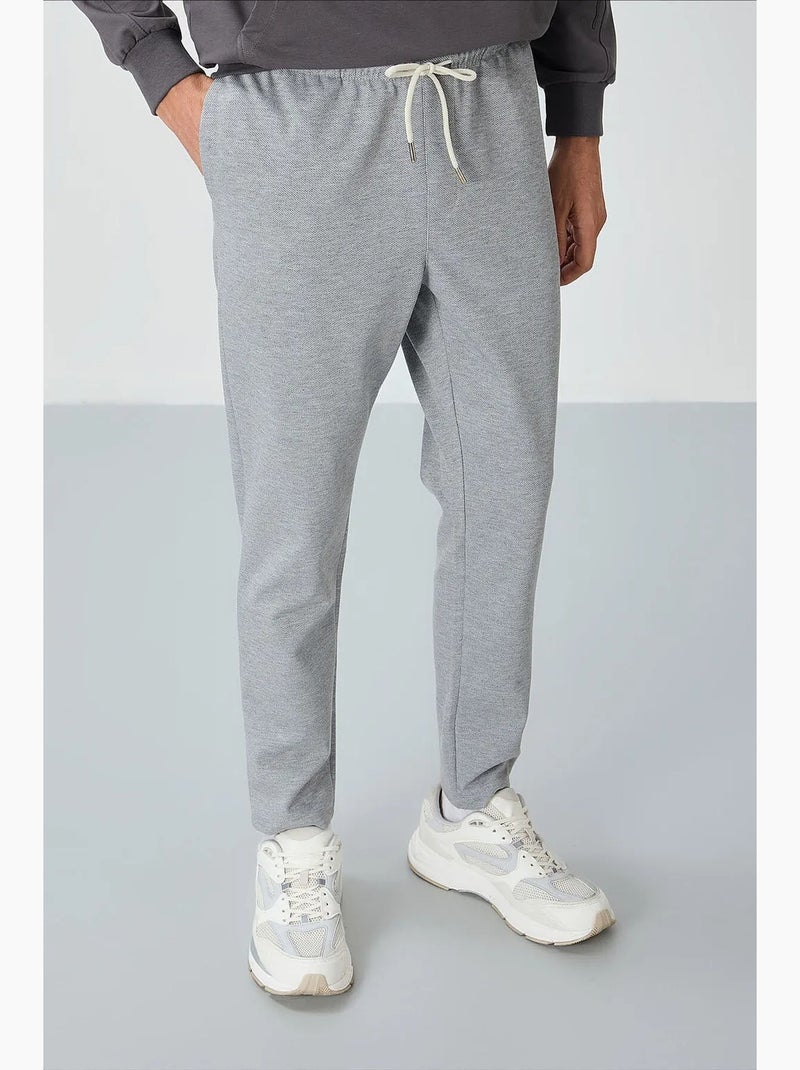 Pantaloni della tuta da uomo in cotone-poliestere tommy Grigio chiaro - Kiabi