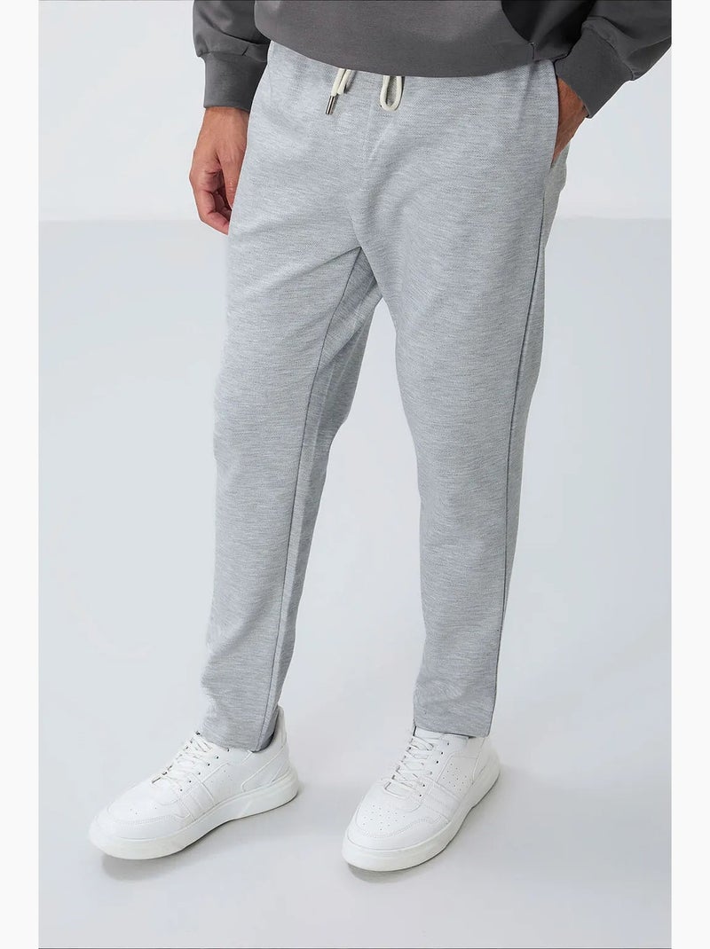 Pantaloni della tuta da uomo in cotone-poliestere tommy Grigio - Kiabi