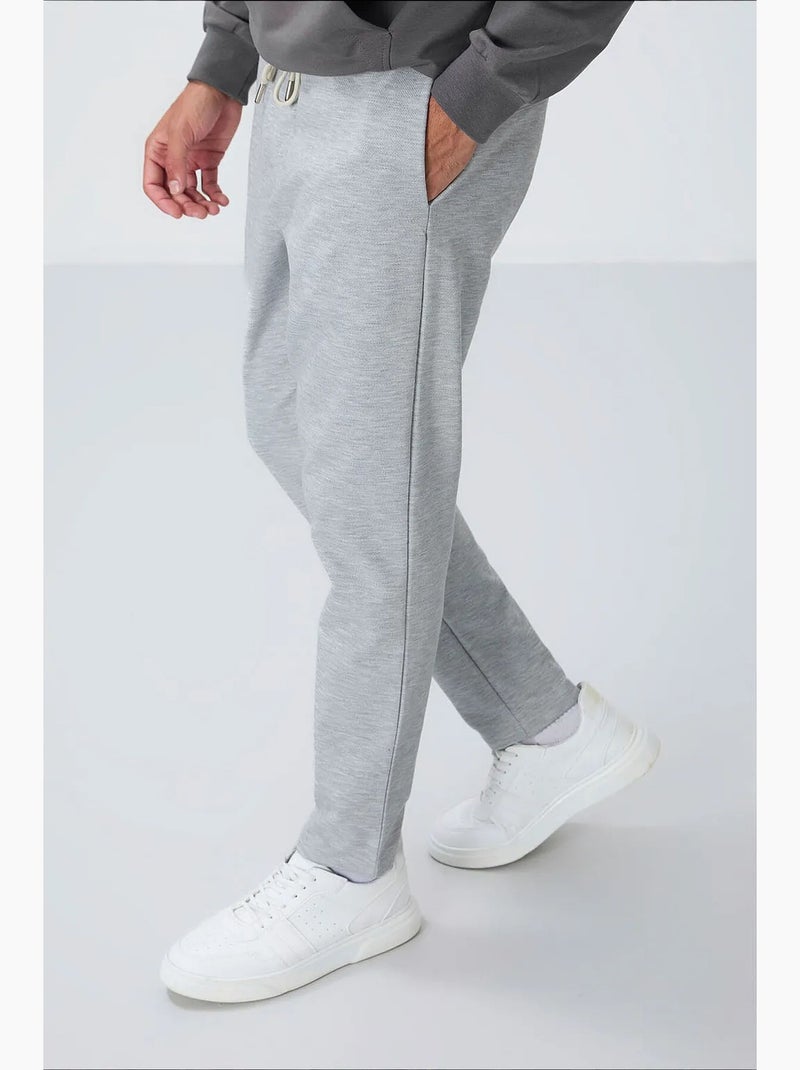 Pantaloni della tuta da uomo in cotone-poliestere tommy Grigio - Kiabi