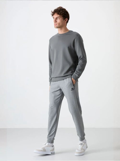 Pantaloni della tuta da uomo in misto cotone tommy - Kiabi Pantaloni della tuta da uomo in misto cotone tommy - Kiabi