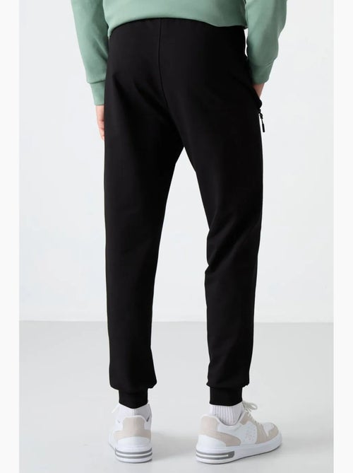 Pantaloni della tuta da uomo in misto cotone tommy - Kiabi Pantaloni della tuta da uomo in misto cotone tommy - Kiabi