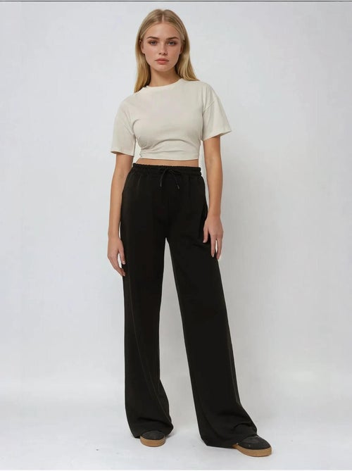Pantaloni della tuta elastici a gamba larga hiccup - Kiabi Pantaloni della tuta elastici a gamba larga hiccup - Kiabi