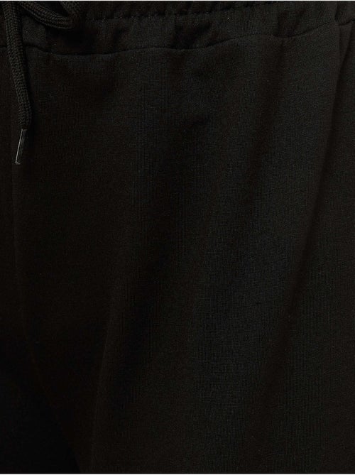 Pantaloni della tuta elastici a gamba larga hiccup - Kiabi Pantaloni della tuta elastici a gamba larga hiccup - Kiabi