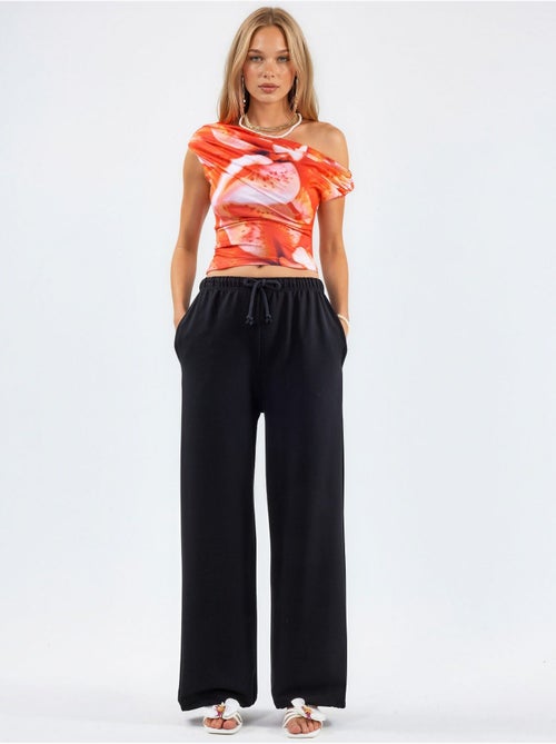 Pantaloni della tuta in misto cotone a gamba dritta da donna busem - Kiabi Pantaloni della tuta in misto cotone a gamba dritta da donna busem - Kiabi