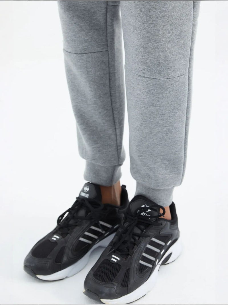 Pantaloni della tuta in pile relaxed fit da uomo tommy Grigio - Kiabi