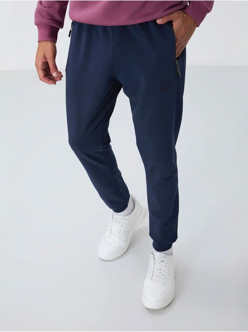 Pantaloni della tuta jogger da uomo con tasca con zip tommy Blu marino - Kiabi