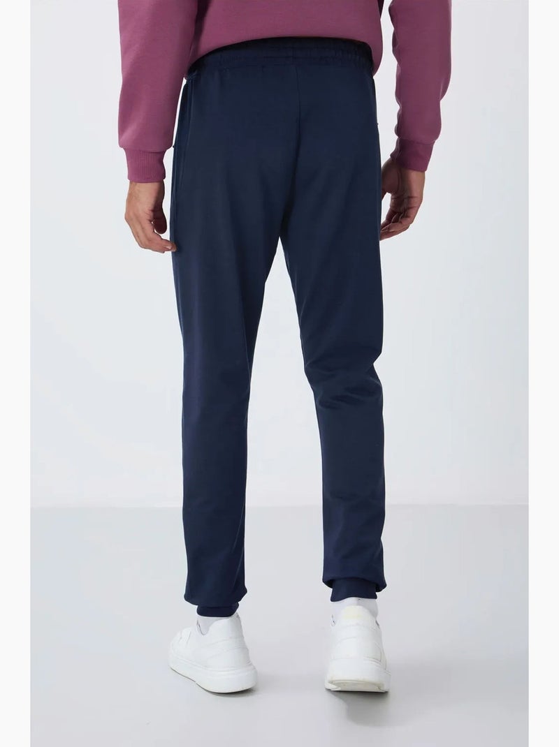Pantaloni della tuta jogger da uomo con tasca con zip tommy Blu marino - Kiabi