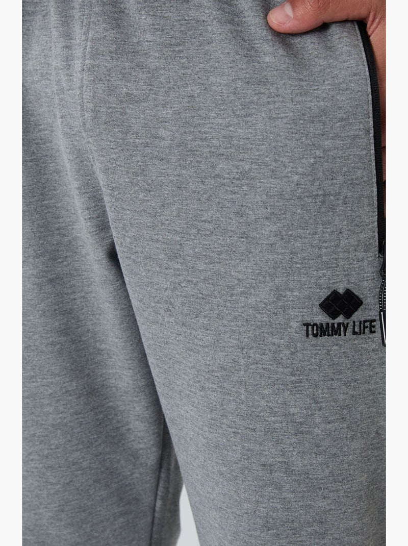 Pantaloni della tuta jogger da uomo con tasca con zip tommy Grigio - Kiabi