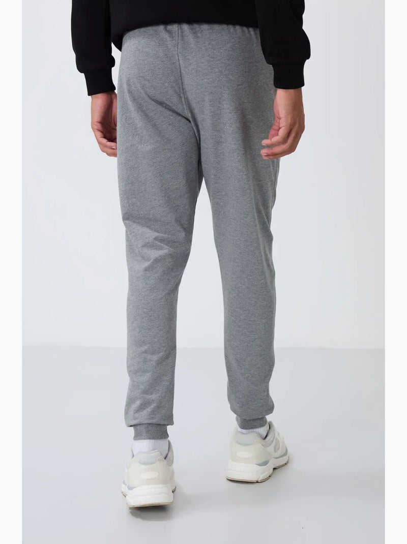Pantaloni della tuta jogger da uomo con tasca con zip tommy Grigio - Kiabi