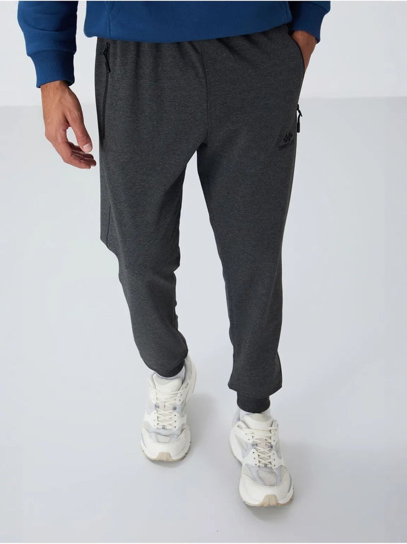 Pantaloni della tuta jogger da uomo con tasca con zip tommy Grigio nero - Kiabi