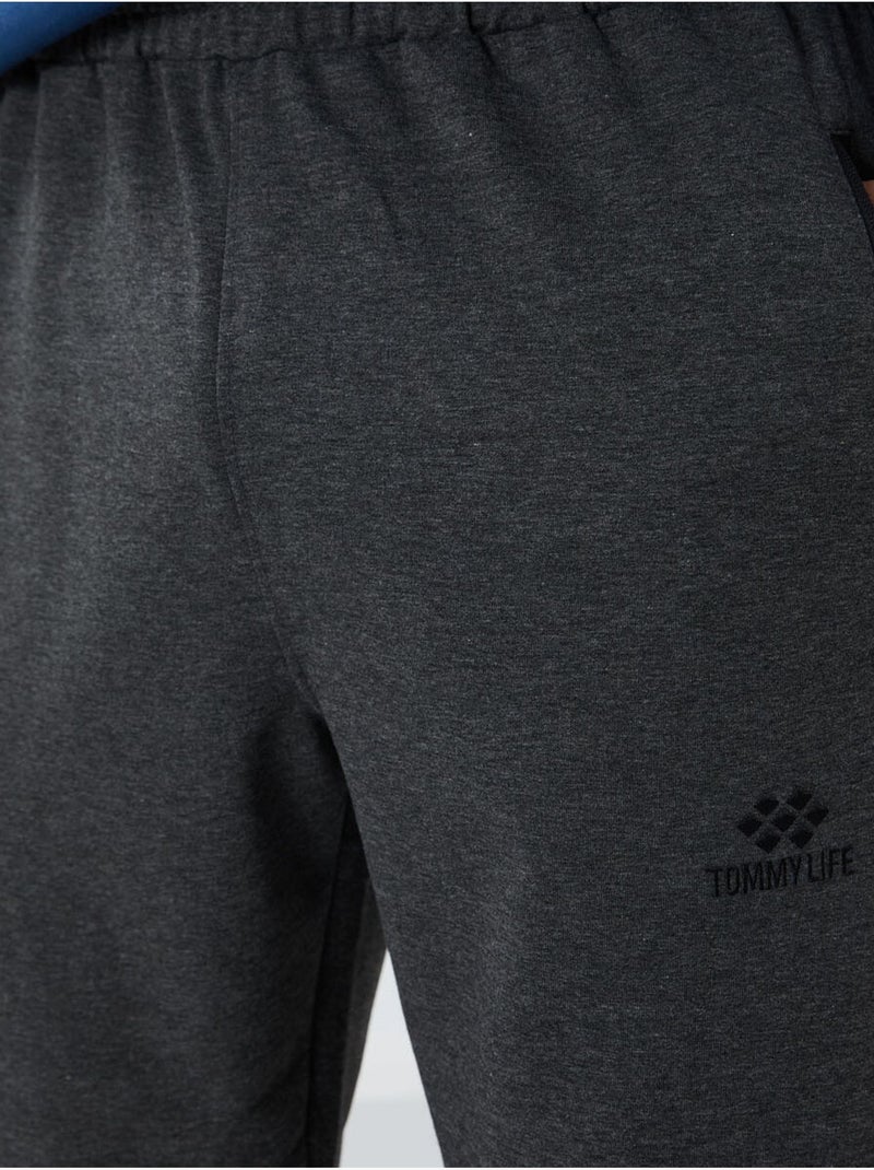 Pantaloni della tuta jogger da uomo con tasca con zip tommy Grigio nero - Kiabi