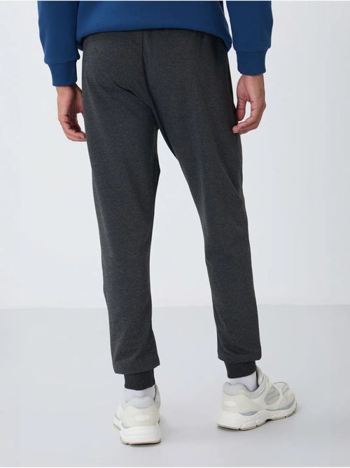 Pantaloni della tuta jogger da uomo con tasca con zip tommy - Kiabi Pantaloni della tuta jogger da uomo con tasca con zip tommy - Kiabi