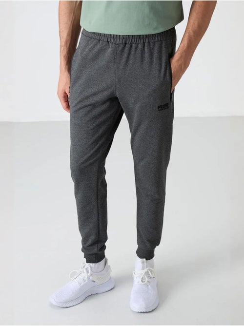 Pantaloni della tuta jogger da uomo tinta unita tommy - Kiabi Pantaloni della tuta jogger da uomo tinta unita tommy - Kiabi