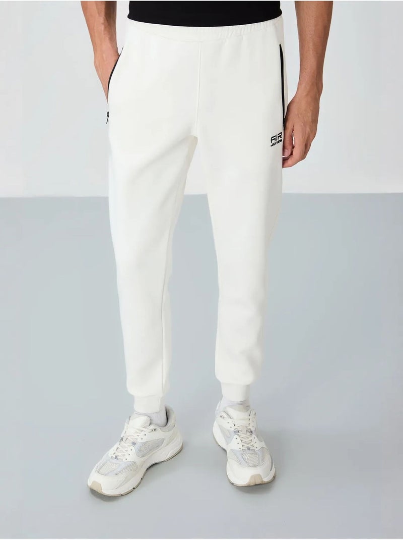 Pantaloni della tuta jogger da uomo tommy Bianco sporco - Kiabi